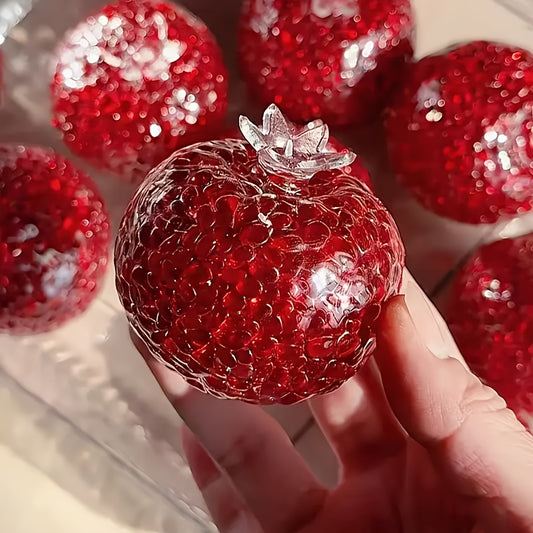 Hand squeezing the Hefeng Squishy Ball, showing its soft and resilient TPR material