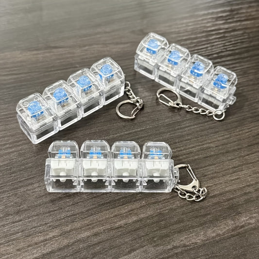 Gizze Vier-Toets Toetsenbord Fidget Sleutelhanger - Stressverlichting Onderweg
