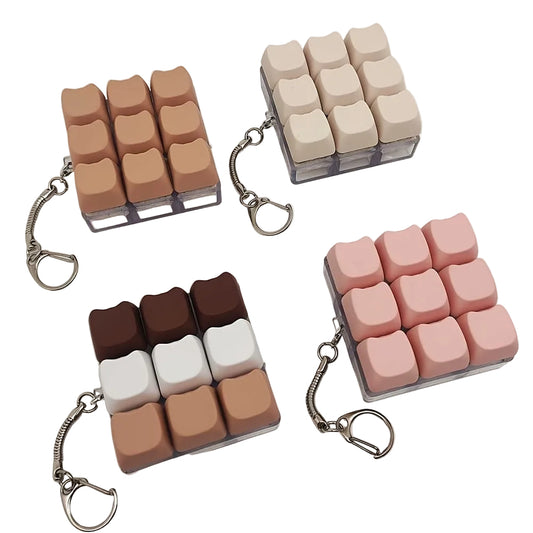 Close-up of a vibrant EG Keycap Pop Fidget Keychain, held in hand, ready to pop for stress relief.