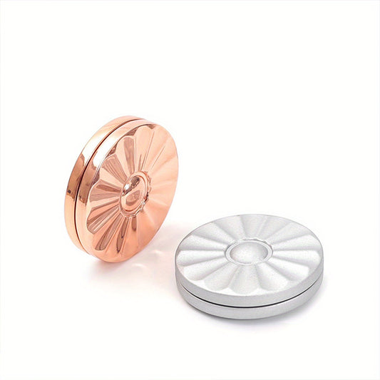 Aluminum fidget spinner with tactile slider in hand, showing compact size and sleek silvery-grey finish for stress relief.